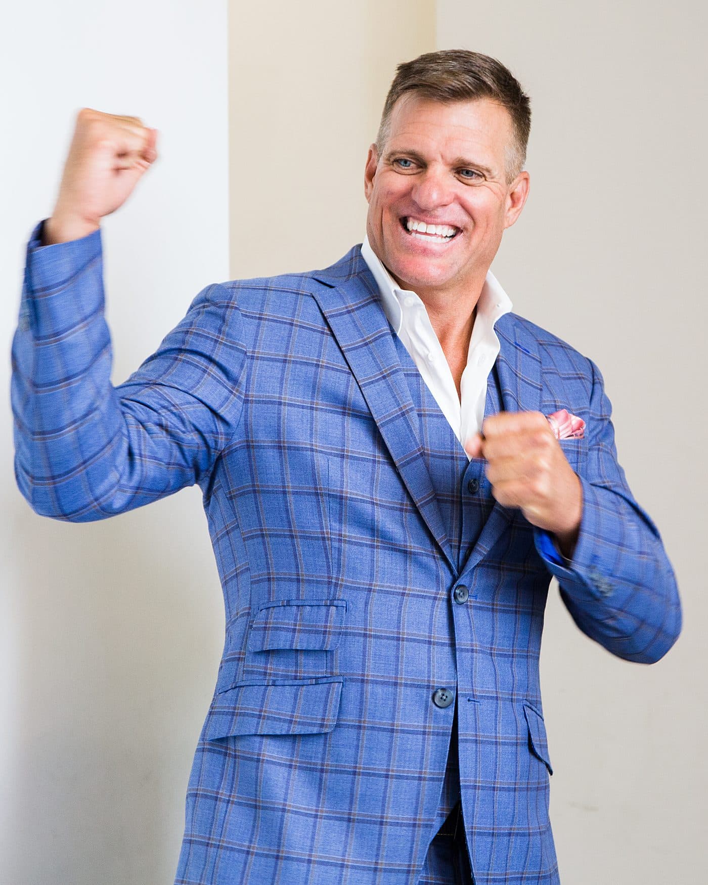 Dave VanHoose with a fist raised, contest energy